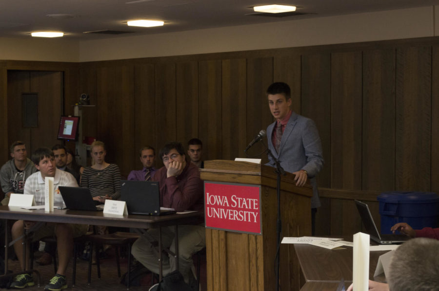 Richard Hartnett, Language Arts and Sciences Senator for the Government Student Body, discusses funding of the Student Loan Education Office during the GSB meeting on Oct. 22 in the Campanile Room.