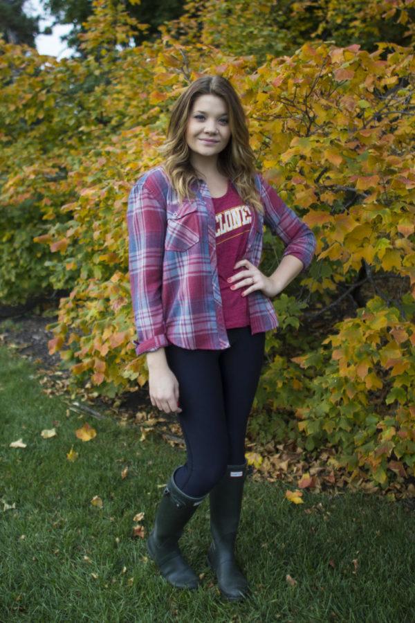 Wearing a plaid button-up shirt can be both stylish and practical as it can help keep you warm and be unbuttoned in order to show off an ISU T-shirt.
