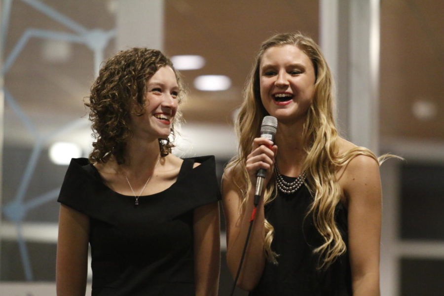 Abby Jones, left, and Ashley De Haan, both seniors in apparel, merchandising and design, kicked off the fashion show as the co-chairwomen for the event. The Sigma Kappa Foundation hosted its annual philanthropy event, the Ultra Violet Fashion Show, on Oct. 18. The event drew in apparel, merchandising and design students and local boutique owners who entered themed garments modeled by sorority chapter members.