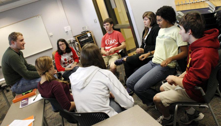 Students in Group C2 participate in a class discussion during a freshman honors class on Oct. 27 at the Jishke Honors Building, led by Preston Schaaf, sophomore in materials engineering, left. 