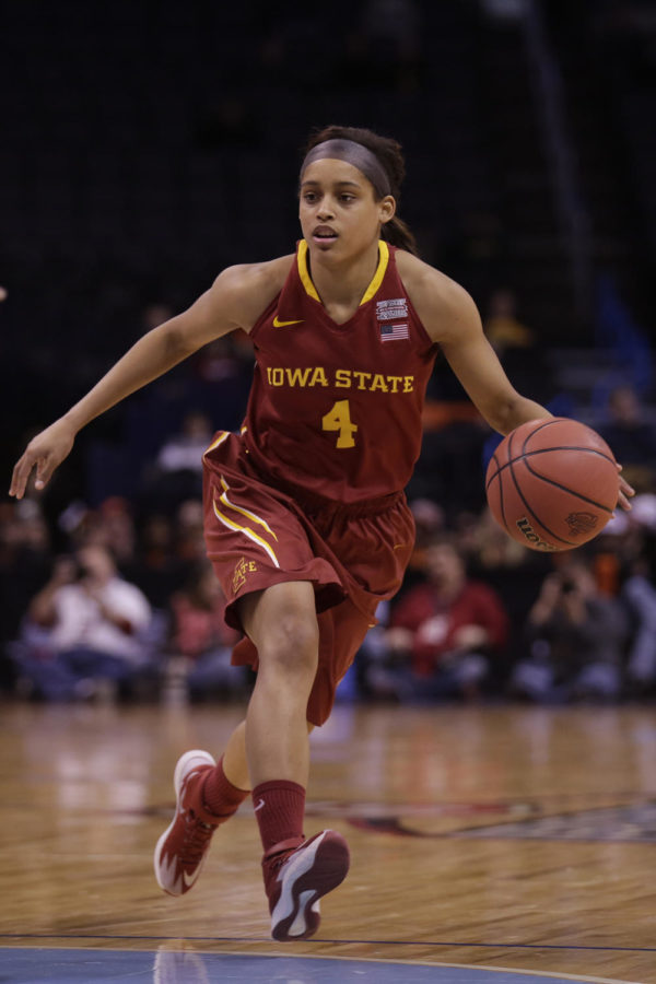 Junior guard Nikki Moody dribbles up court during Iowa States 67-57 loss to the Oklahoma State Cowgirls on March 8 at the Chesapeake Energy Arena in Oklahoma City, Okla. Moody scored 14 points for the Cyclones.