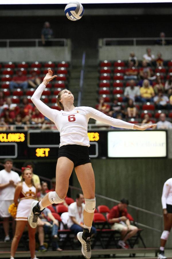 Freshman outside hitter and middle blocker Alexis Conaway jumps, ready to crush the ball over the net during a set against Northern Illinois in the Iowa State Challenge on Sept. 6. The Cyclones defeated the Huskies in three straight sets.