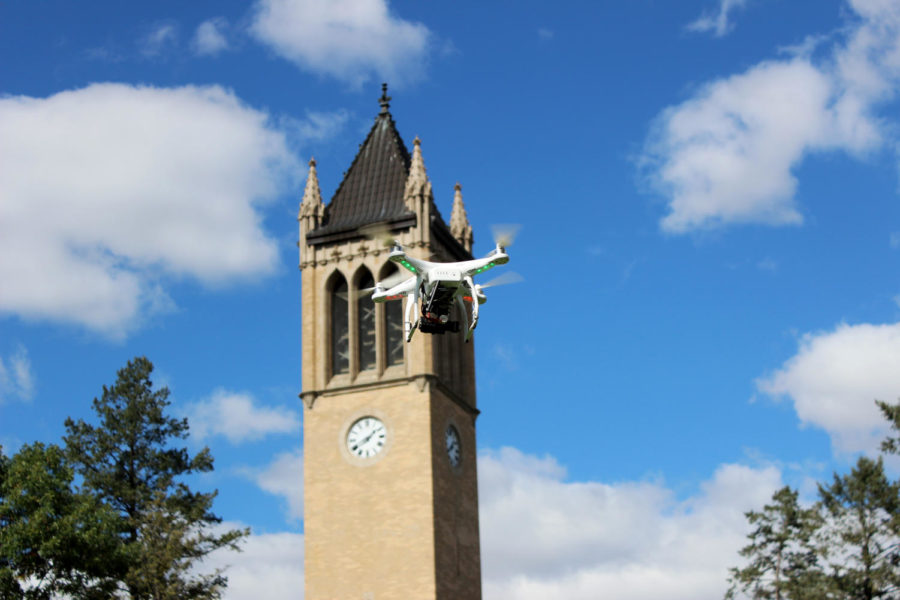 AJ McNeil flies his drone near the Campanile on Oct. 7. McNeil uses his drone for his internship with Peoples Company to sell farms, development land and houses. 
