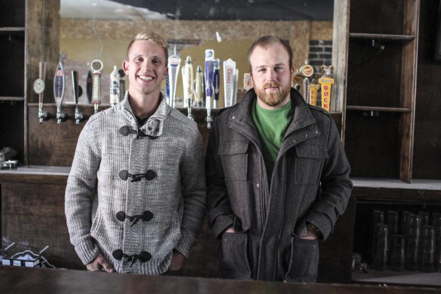 Teddy Van Hove, left, and Brandon Fick, right, teamed together to purchase the former Charlie Yokes bar on Lincoln Way and are currently remodeling the space into an upscale bar called The District. The bar is scheduled to open sometime in December.