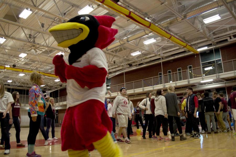 Cy attempts to pump up the crowd by dancing during the Up til Dawn fundraiser event for St. Judes Childrens Hospital. The event took place on the morning of Nov. 15 at the State Gym.