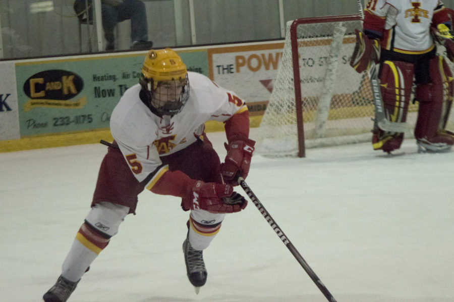 Freshman Jake Uglem, defense, races down the rink in attempt to block a shot during the Iowa State University game against Ohio University on Oct. 31. Iowa State pulled ahead in overtime with a 2-1 score.