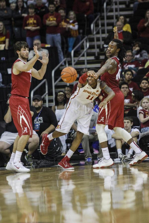 Sophomore guard Monte Morris gets fouled during the CBE Hall of Fame semifinal against Alabama at the Sprint Center in Kansas City, Mo., on Nov. 24. The Cyclones defeated the Crimson Tide 84-74. Morris had 12 assists for the Cyclones.