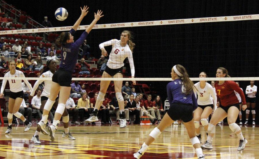 Freshman outside hitter and middle blocker Alexis Conaway spikes the ball past the Kansas State Wildcats. The ISU volleyball team won all three sets against Kansas State on Nov. 5 at Hilton Coliseum. The final scores were 25-23, 25-23 and 25-22.