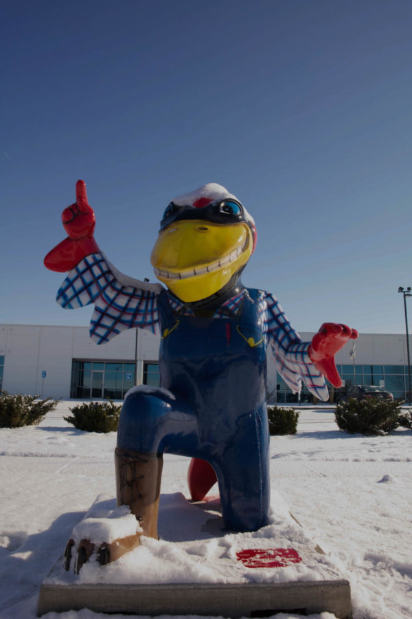 Farmer Cy by Shawn Palek, at Syngenta in Ames. The statue is one of five up for auction on December 4th.