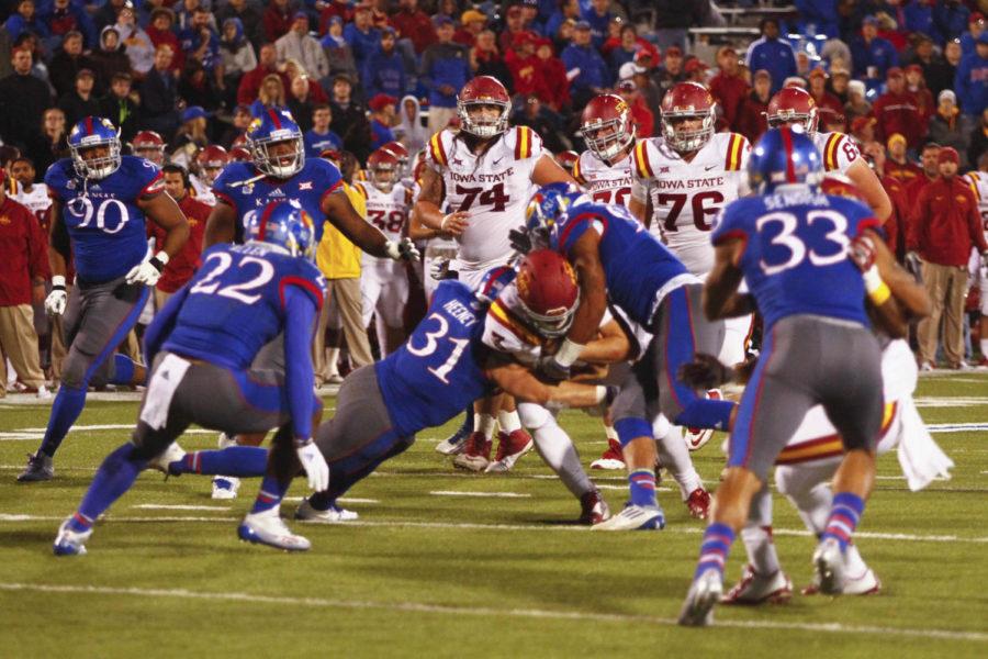 Redshirt+sophomore+Grant+Rohach+is+taken+down+by+the+Kansas+defense+on+Nov.+8+at+Lawrence%2C+Kan.+Cyclones+fell+to+the+Jayhawks+34-14.