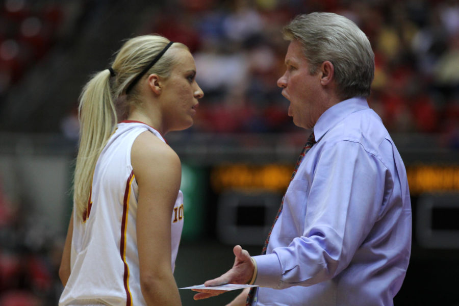 ISU coach Bill Fennelly yells at freshman guard Jadda Buckley after an ineffective play during the game against the Texas Longhorns at Hilton Coliseum on Feb. 22, 2014. After a slow start, the Cyclones offense picked up and went neck-and-neck with the Longhorns until they hit a 13-0 run to pick up the lead.