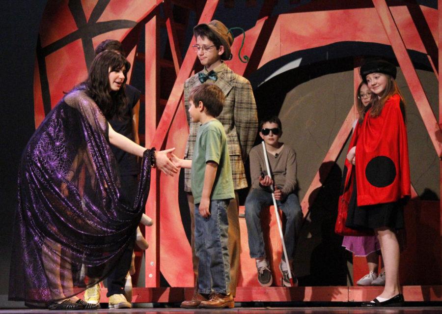 The cast of James and the Giant Peach get ready for opening night at their final rehearsal at the Ames City Auditorium on Nov. 6. The lead role of James is played by 4th grader Ryan Henzi, 9, in green. The performances will take place at 7 p.m. on Nov. 7 and 14, and 2 p.m. Nov. 8, 9, 15 and 16 at the Ames City Auditorium on 520 6th Street.