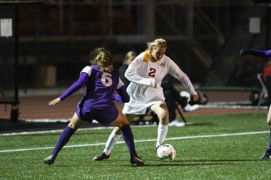 Sophomore forward Koree Willer cuts past a TCU defender towards the goal. Iowa State beat TCU 1-0 on Oct. 31 after scoring in the final minutes of the game.