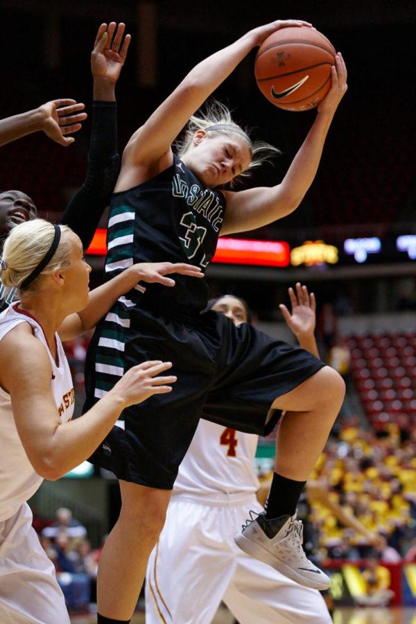 University of South Carolina Upstate senior guard Maddie Herr recovers the ball from several members of the ISU team. Iowa State beat USC Upstate 98-76 on Nov. 16 and led by 20 points for nearly the entire game.