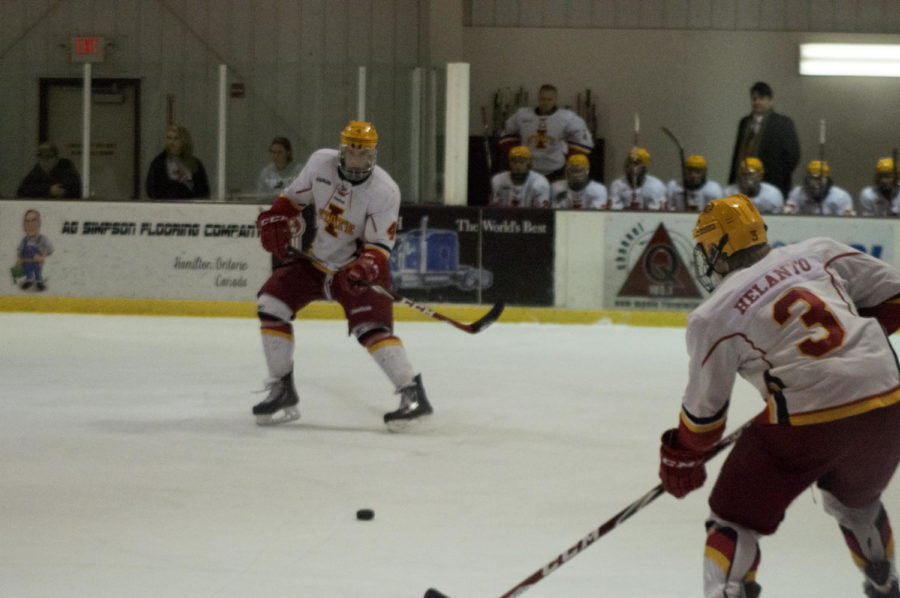 Senior Antti Helanto receives a pass from his teammate during Cyclone Hockeys game against Ohio University on Oct. 31 at the Ames Ice Arena. The Cyclones won with a 2-1 score.