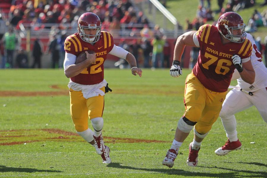 Redshirt junior quarterback Sam Richardson runs the ball on the keep during the game against Oklahoma on Nov. 1. Richardson had 15 completions, rushed for 20 yards and scored an 18-yard touchdown. The Cyclones fell to the No. 19 Sooners with a final score of 59-14.