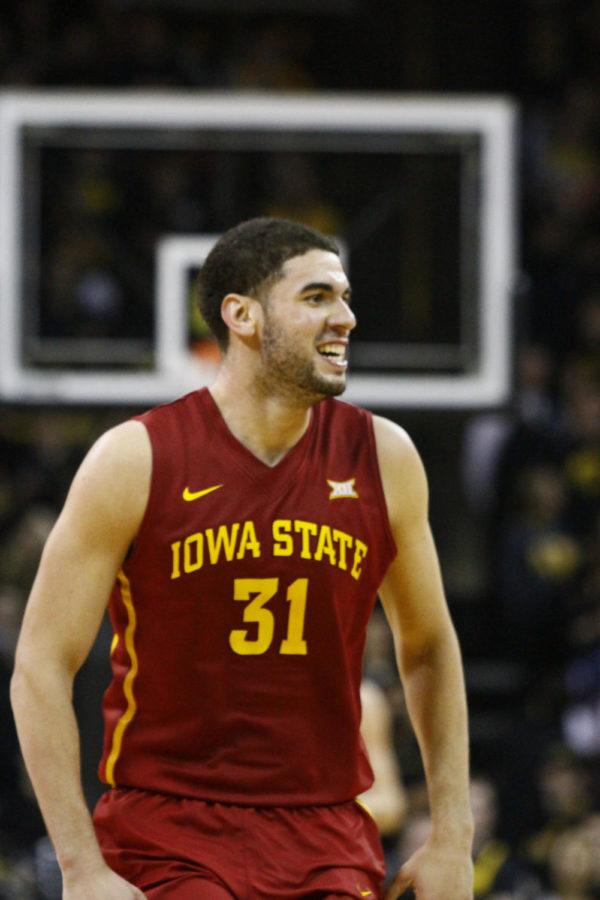 Junior forward Georges Niang smiles to the bench against Iowa on Dec. 12 at Carver-Hawkeye Arena. The Cyclones beat the Hawkeyes 90-75. Niang finished the game with 14 points.
