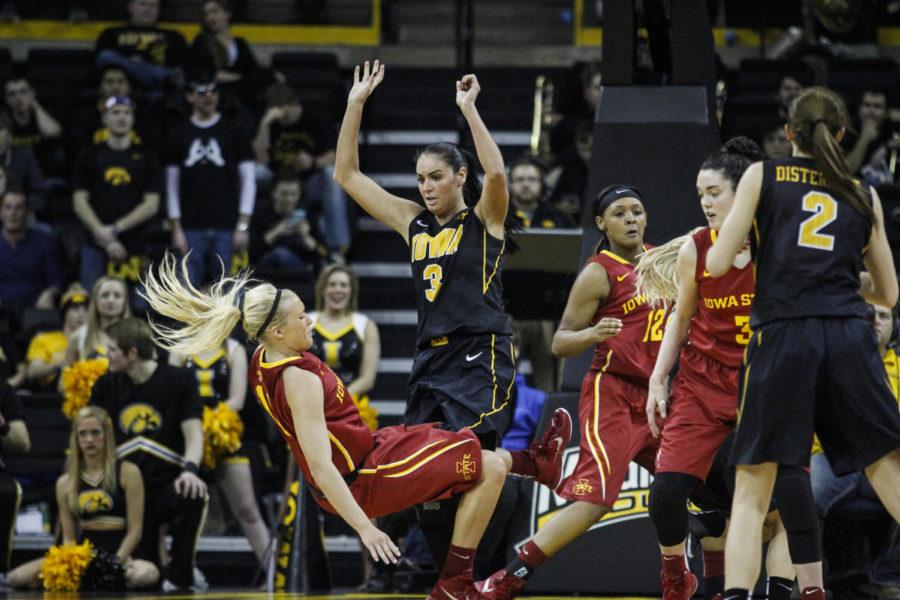 Sophomore guard Jadda Buckley is fouled by Iowas Claire Till at Carver-Hawkeye Arena in Iowa City on Dec. 11. The Cyclones fell to the Hawkeyes 76-67. Buckley led the Cyclones with 25 points and was 7-for-8 at the free-throw line.
