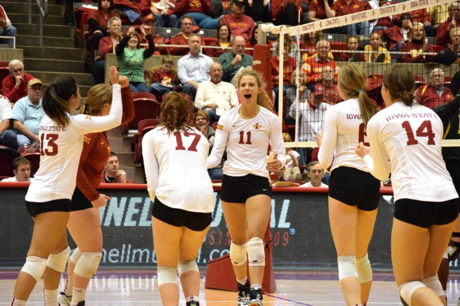 Sophomore outside hitter Ciara Capezio celebrates with her team after scoring a point against Baylor on Nov. 29. 