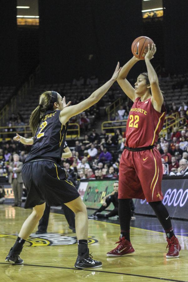 Senior forward Brynn Williamson looks for a pass against Iowa at Carver-Hawkeye Arena in Iowa City on Dec. 11. The Cyclones fell to the Hawkeyes 76-67.