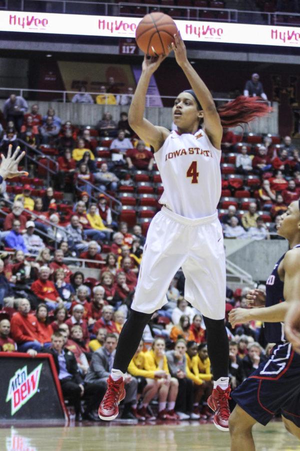 Senior guard Nikki Moody puts up a three-pointer against Howard during the first round of the Cyclone Challenge on Dec. 29 at Hilton Coliseum. Moody had nine points in the 90-44 win.