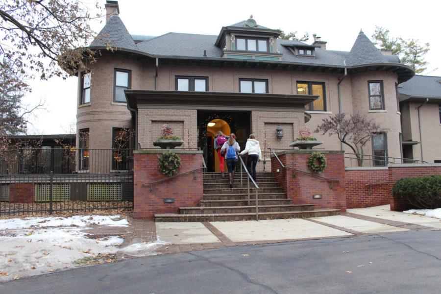 Students head into the presidents residence, known as the Knoll, for hot chocolate with President Steven Leath and First Lady Janet Leath during WinterFest on Dec. 5. 