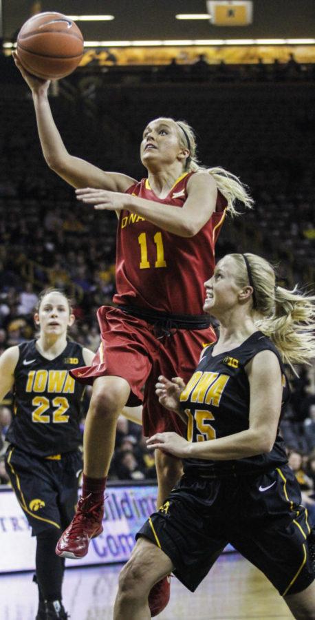 Sophomore guard Jadda Buckley goes up for a basket against Iowa on Dec. 11 at the Carver-Hawkeye Arena in Iowa City. The Cyclones fell to the Hawkeyes 76-67.