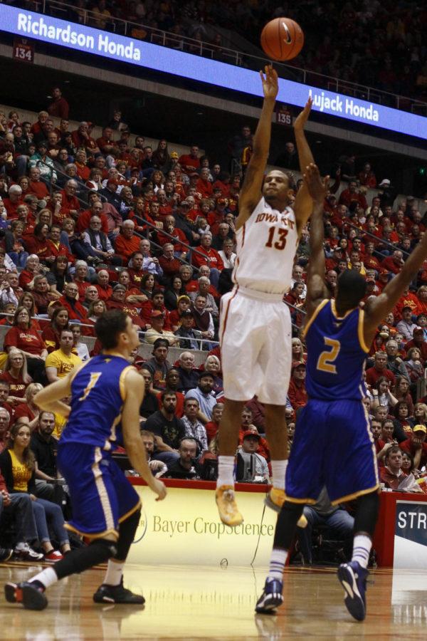 Senior forward Bryce Dejean-Jones shoots a three-pointer against Kansas City on Dec. 9 at Hilton Coliseum. The Cyclones beat the Kangaroos 73-56. Dejean-Jones went 9-for-12 from the field and lead the team with 22 points.