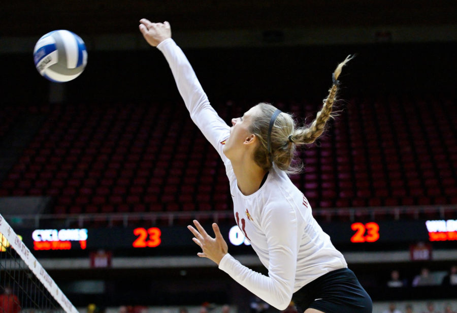 Sophomore outside hitter Ciara Capezio hits a spike over the net in a game against Kansas State on Nov. 5 at Hilton Coliseum. Iowa State defeated Kansas State in three close sets and showcased a new offensive strategy that yielded results, according to Coach Christy Johnson-Lynch.