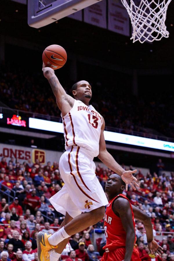 Senior guard Bryce Dejean-Jones attempts a dunk after breaking away from Lamar defenders. Iowa State defeated Lamar on Dec. 2 with a final score of 96-59.