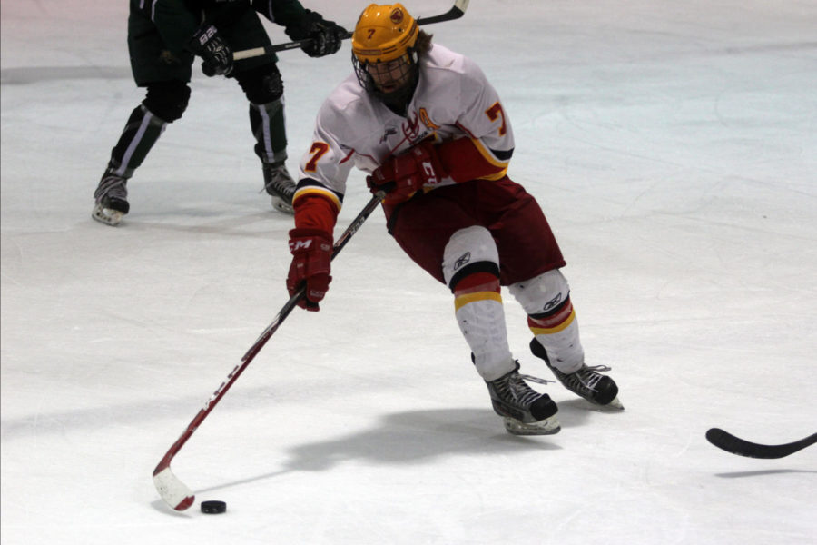Senior forward Trevor Lloyd pushes through Ohio Universitys line of defense during their matchup on Nov. 1.  The Cyclones suffered a 4-2 loss to the Bobcats.