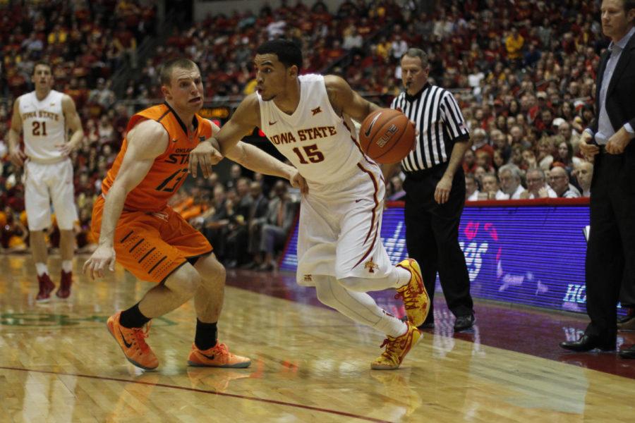 Junior guard Naz Long moves the ball up the court during Iowa States matchup against Oklahoma State on Jan. 6. Long scored seven points with two assists, helping Iowa State to a 63-61 victory and its first Big 12 conference win.