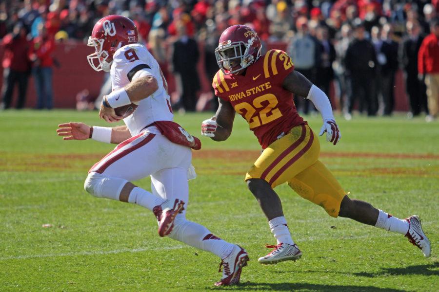 Redshirt sophomore defensive back T.J. Mutcherson chases down the Oklahoma ball carrier Nov. 1. Mutcherson tallied a career-high 10 tackles during the game against No. 19 Oklahoma. Iowa State fell during the matchup with a final score of 59-14.