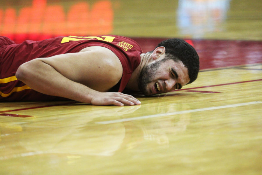 Junior forward Georges Niang lays on the court after being fouled against Drake on Dec. 20. Niang scored nine points with one assist, helping Iowa State defeat the Drake Bulldogs during the Hy-Vee Big Four Classic with a final score of 83-54.