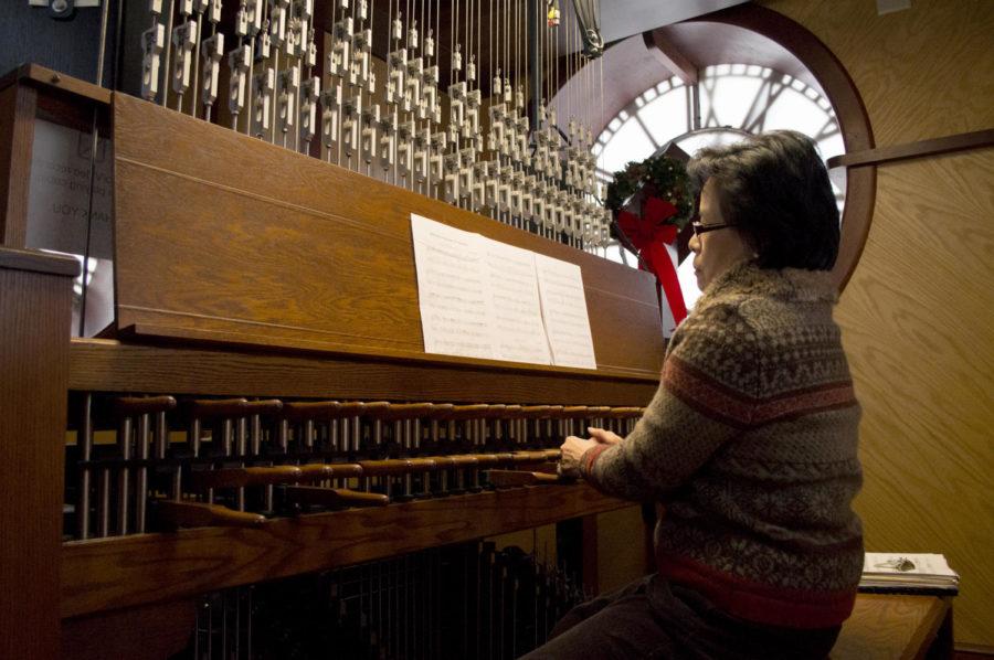 Tin-Shi Tam, associate professor at ISU, plays Christmas themed tunes on the Carillon on Dec. 10 at the Campanile. Tin-Shi plays the Carillon every weekday at noon.
