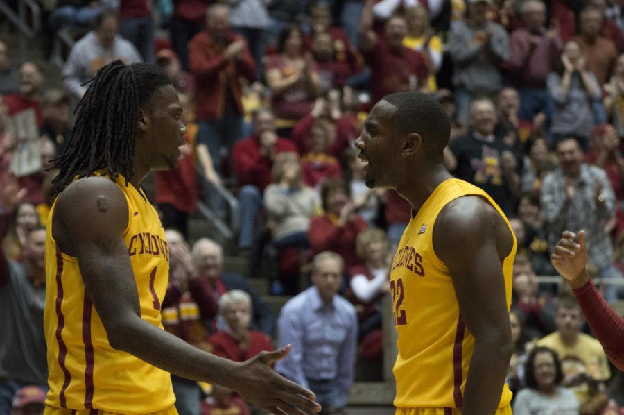 Redshirt junior Jameel McKay celebrates with his teammates after a successful play in the Kansas State and Iowa State mens basketball game on Jan. 20. Iowa State won 77-71.