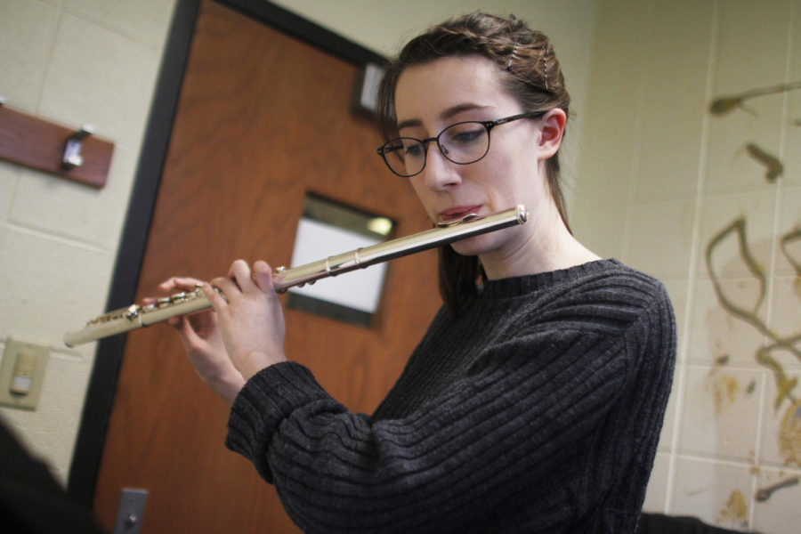 Elaine Kramme, senior in music, practices her flute for the upcoming performance of the Cyclone Honor Band during the first week of February.
