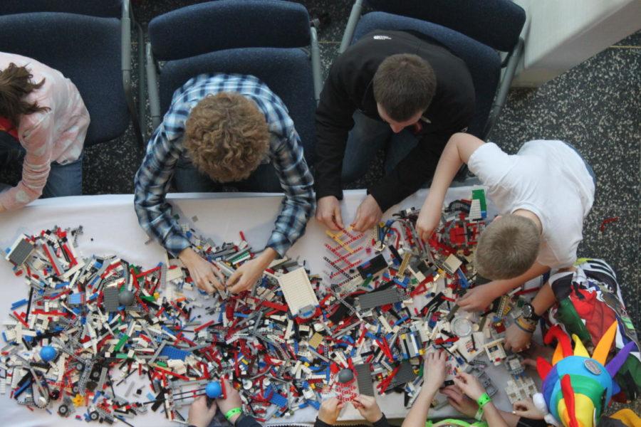 Groups of LEGO fans build with bricks at the FIRST LEGO League competition Jan. 17 in Hoover Hall.