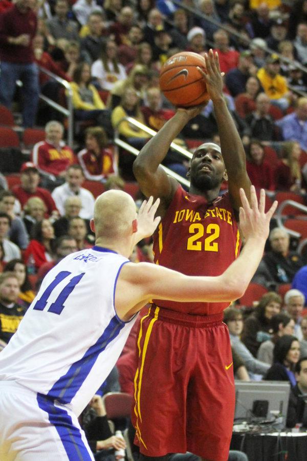 Senior forward Dustin Hogue shoots the ball from beyond the  three-point line during Iowa States matchup with the Drake Bulldogs on Dec. 20 at Wells Fargo Arena. Hogue scored 10 points with two assists, helping Iowa State defeat the Bulldogs during the Hy-Vee Big Four Classic with a final score of 83-54.