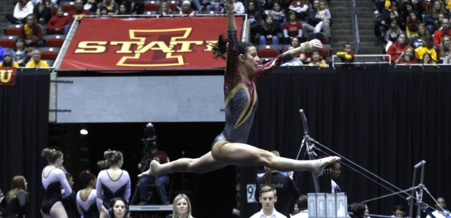 Sophomore Allie Hansen executes a leap during her floor performance. Hansen received a 9.725 score as Iowa State lost to Oregon State 195.950-195.975 Jan. 18. 