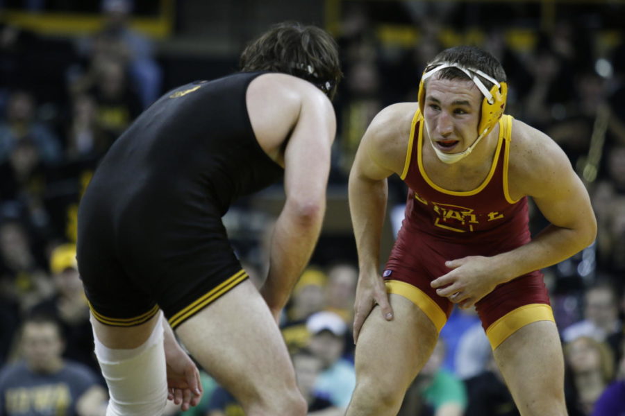 Redshirt+senior+Tanner+Weatherman+faces+off+against+Iowa%E2%80%99s+Mike+Evans.+Weatherman+went+scoreless+for+two+periods+before+earning+four+points+late+in+the+174-pound+match+at+the+Cy-Hawk+Series+duel+took+place+on+Nov.+29+in+Iowa+City.+The+No.+15+Cyclones+struggled+to+secure+matches+that+were+close%2C+falling+to+rival+No.+1+Iowa+28-8.