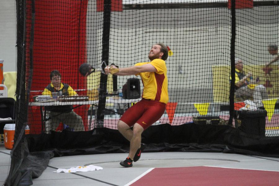 Redshirt senior Henery Kelley performs in the weight throw during the Big Four Duals on Jan. 24. Kelley placed first with a distance of 18.86 meters.