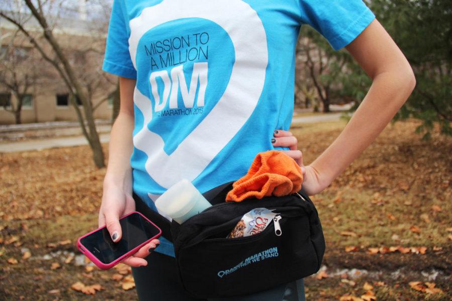 Wearing a fanny pack filled with essentials like extra socks, deodorant, snacks and a phone charger is important to survive Dance Marathon.