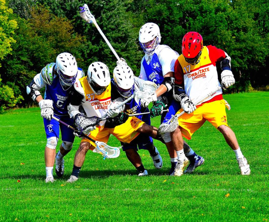 Players scramble for the ball during a lacrosse match put on by the ISU Lacrosse Club.