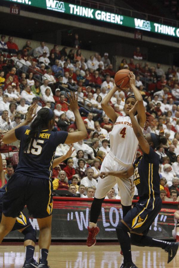Senior guard Nikki Moody shoots the ball during the first half against West Virginia on Feb. 7. Iowa State won the game 61-43.