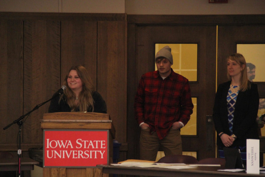 GSB visuals director Caitlin Deaver speaks about a proposal to change the name of Government of the Student Body to simply Student Body during the Feb. 18 meeting. Behind Deaver are other senators who back the proposal.