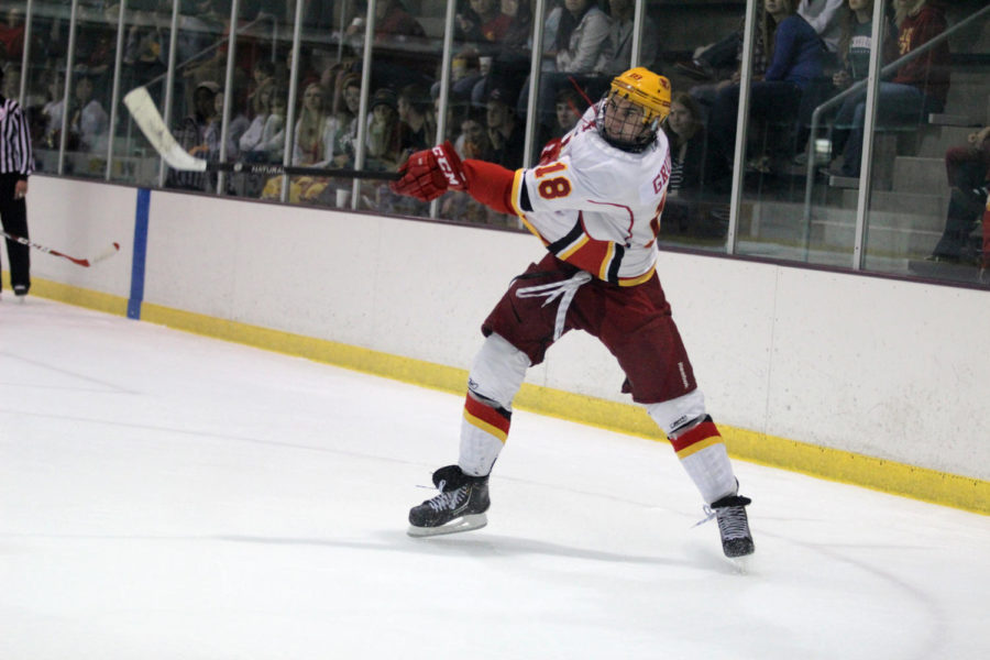 Sophomore, Alex Grupe finishes his swing after hitting the puck. The Cyclones beat Harbin, a team from China, 8-0 Sept 26. 