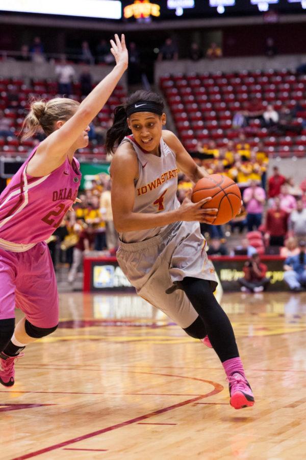 Senior guard Nikki Moody drives through the Oklahoma offense for the layup.  ISU won the Feb. 17 game 84-76 over Oklahoma in overtime after coming back from an early Oklahoma lead.