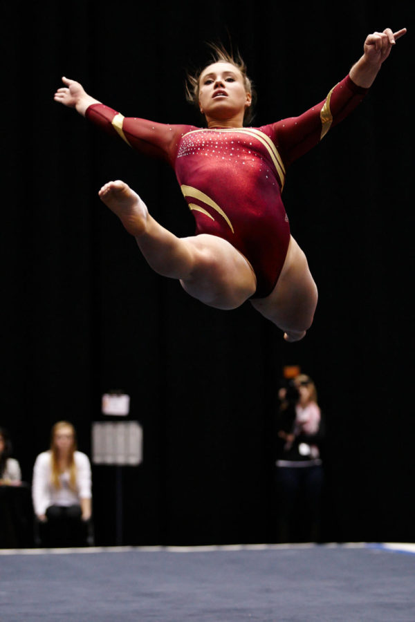 Freshman Kelsey Paz leaps into the air during her floor routine against Oklahoma on Feb. 6.