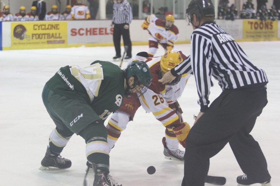 Senior forward Nate Percy faces off against a Colorado State player during their matchup on Nov. 22.  ISU defeated Colorado State with a final score of 5-2.
